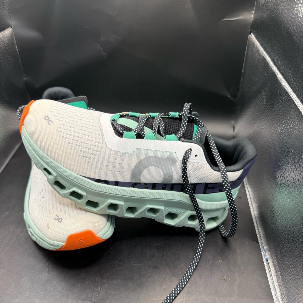 Women’s size 9 On Clouds. Very comfortable; gently worn.